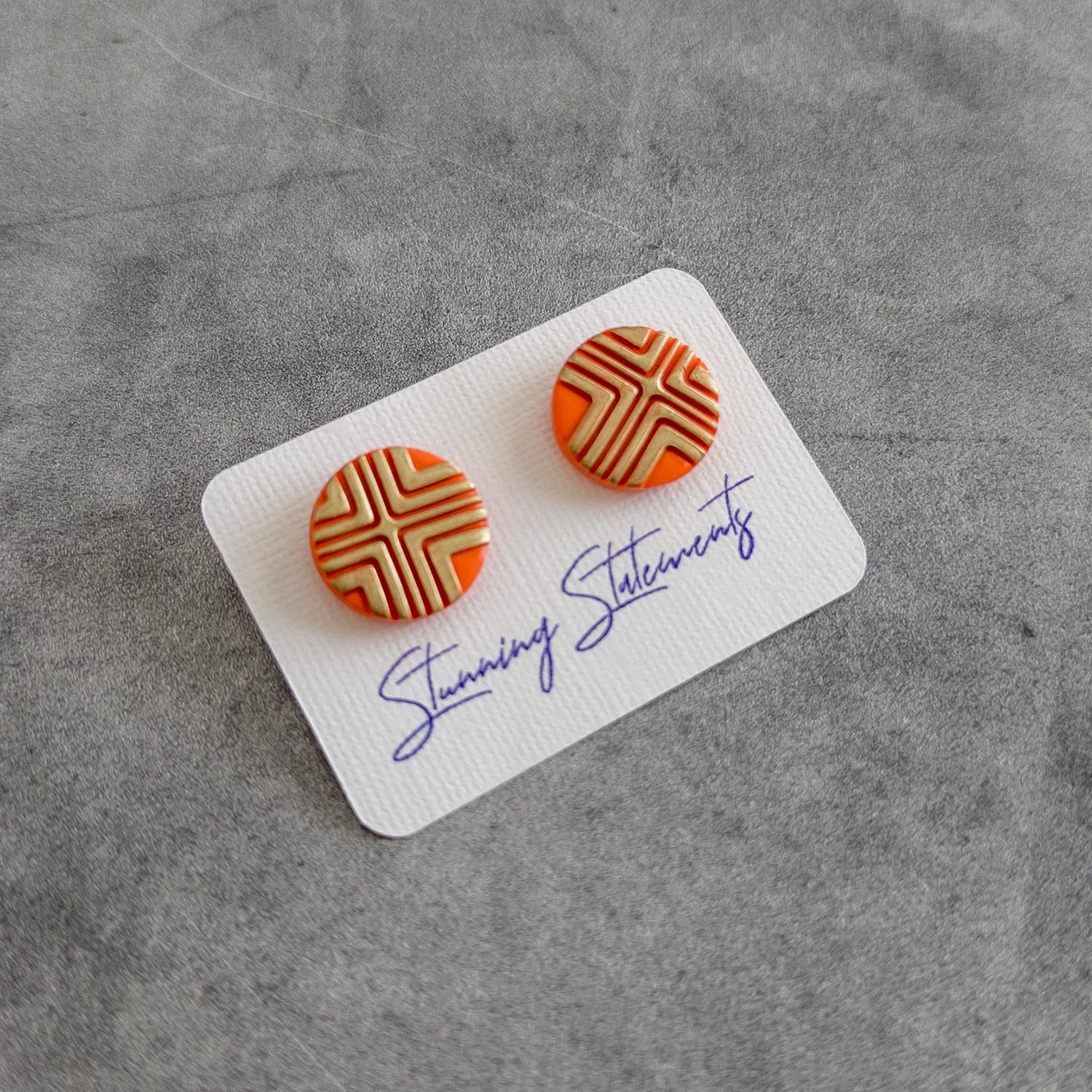stunning statements textured bright bold colorful orange cleo stud earrings