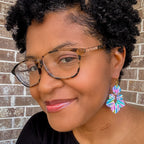 stunning statements handmade polymer clay multicolored lightweight floral textured spring summer flower dangle earrings on a model