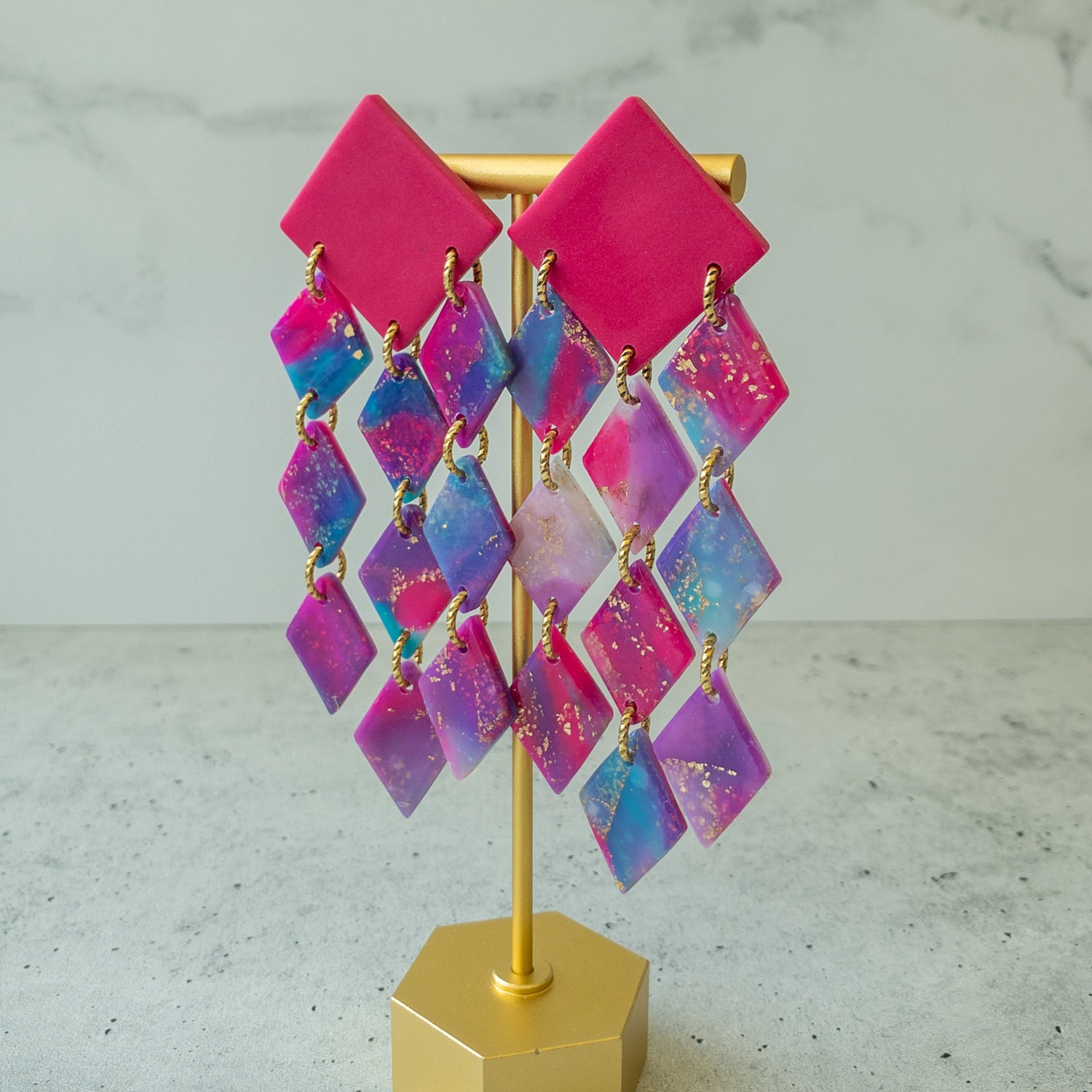stunning statements bold oversized colorful bright purple pink teal statement clay earrings