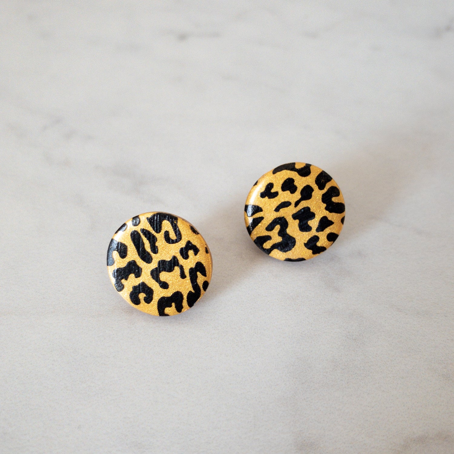 stunning statements gold cheetah print statement stud clay amara earrings