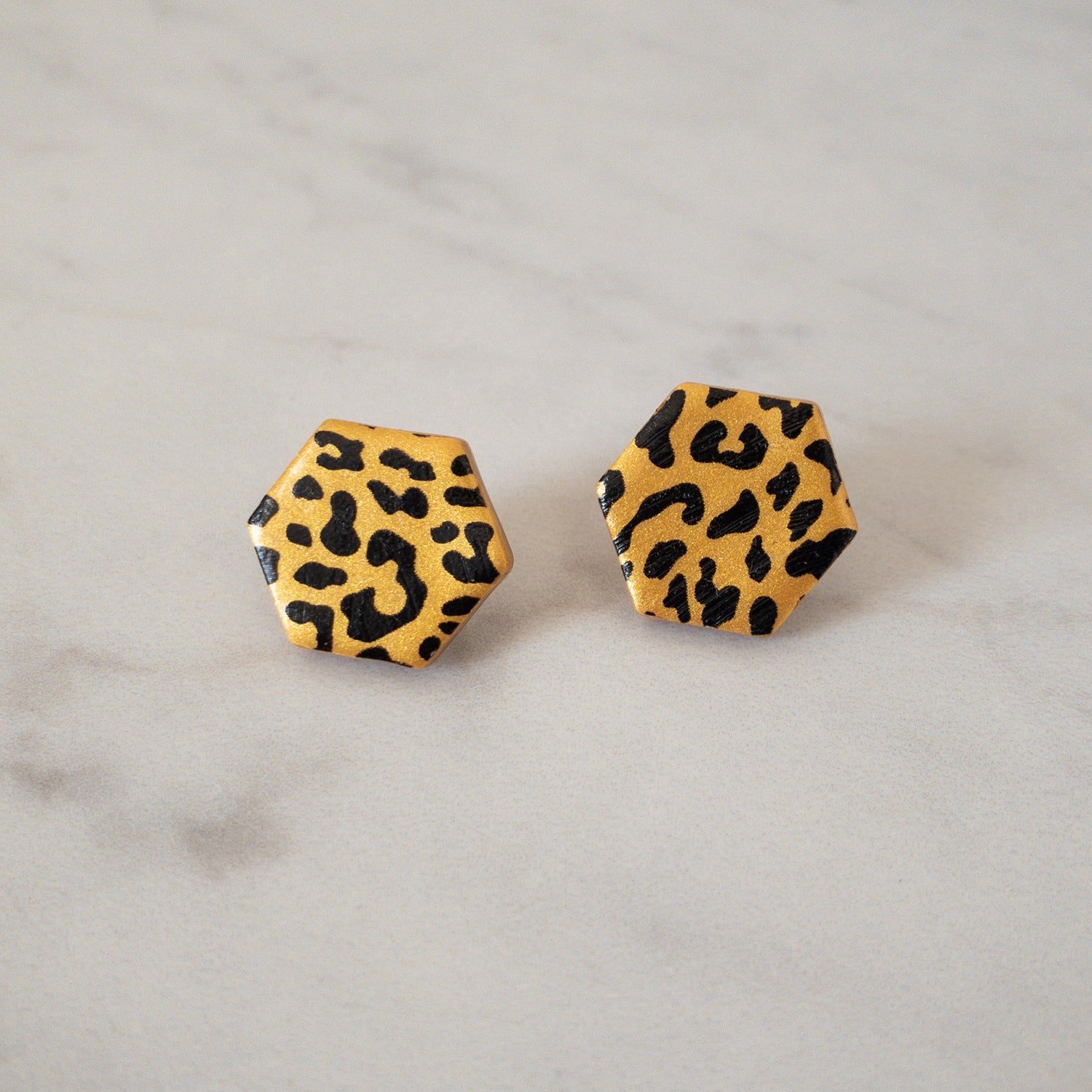stunning statements gold cheetah print statement stud clay earrings